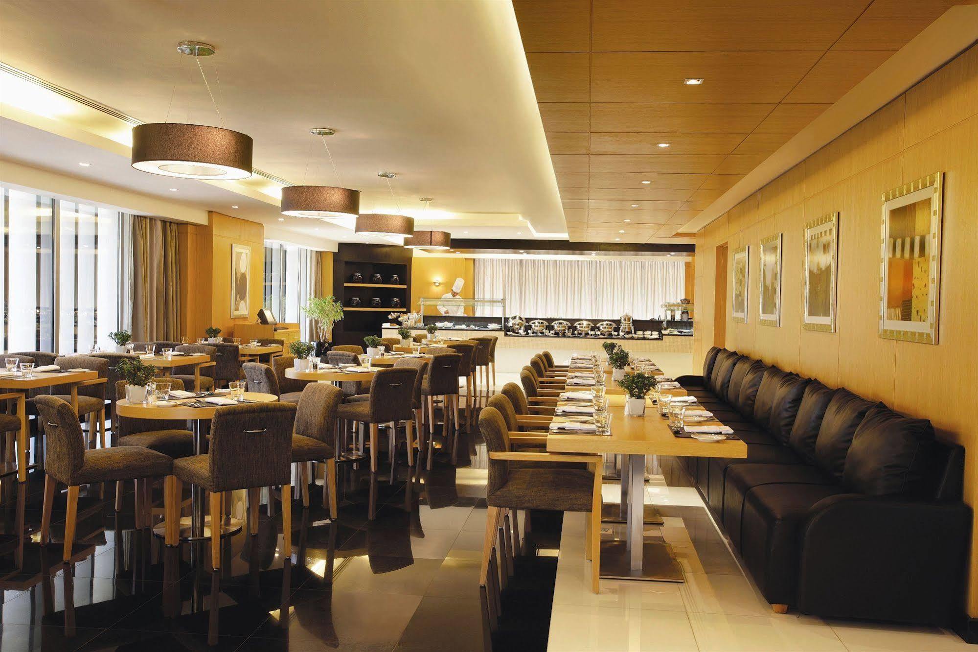 Hala Arjaan By Rotana, Deluxe Hotel Apartments Abu Dhabi Restaurant photo